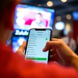 User navigating Zulubet app withdrawal options on a smartphone screen